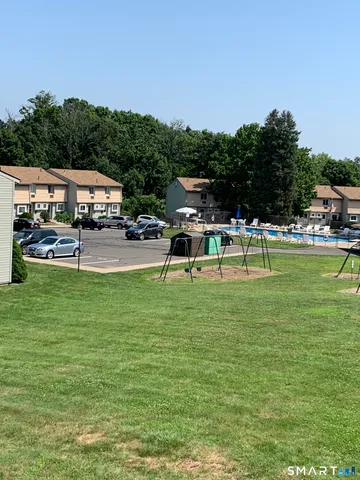 a view of a house with a big yard