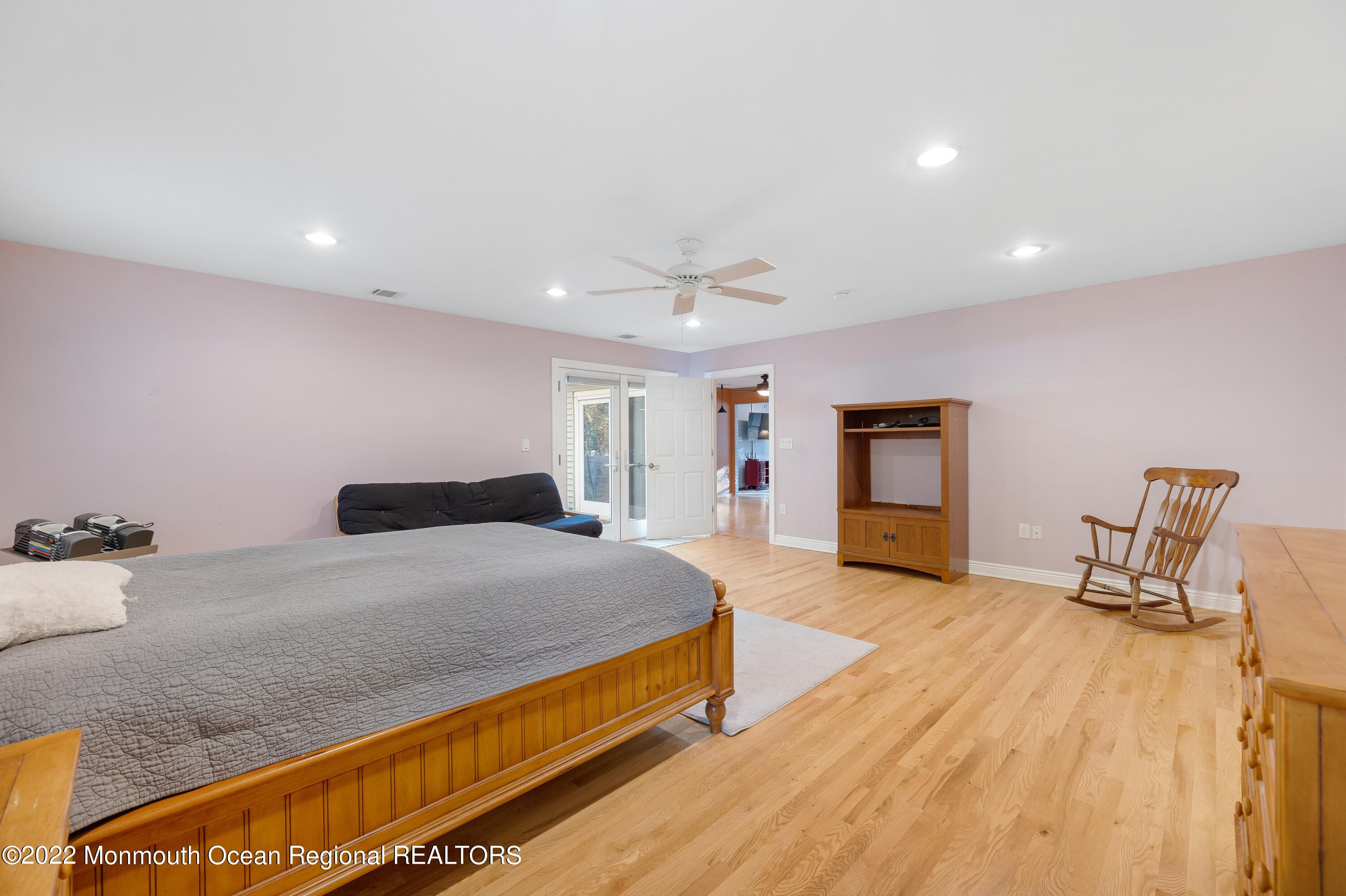401 Leesville Road Jackson, NJ 08527 - Photo 11 of 25 a spacious bedroom with a bed and a chair