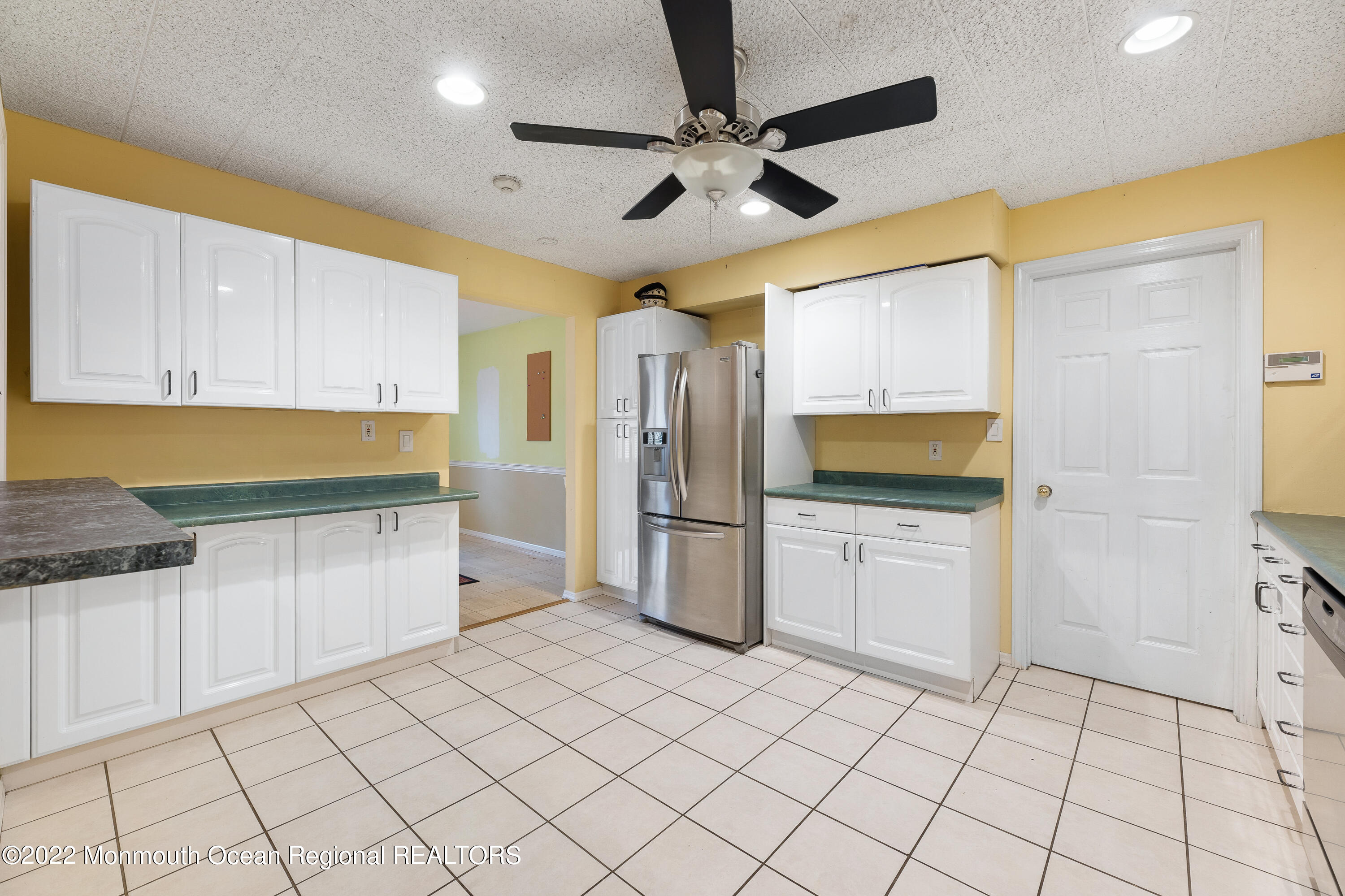 401 Leesville Road Jackson, NJ 08527 - Photo 8 of 25 a kitchen with a refrigerator sink and cabinets
