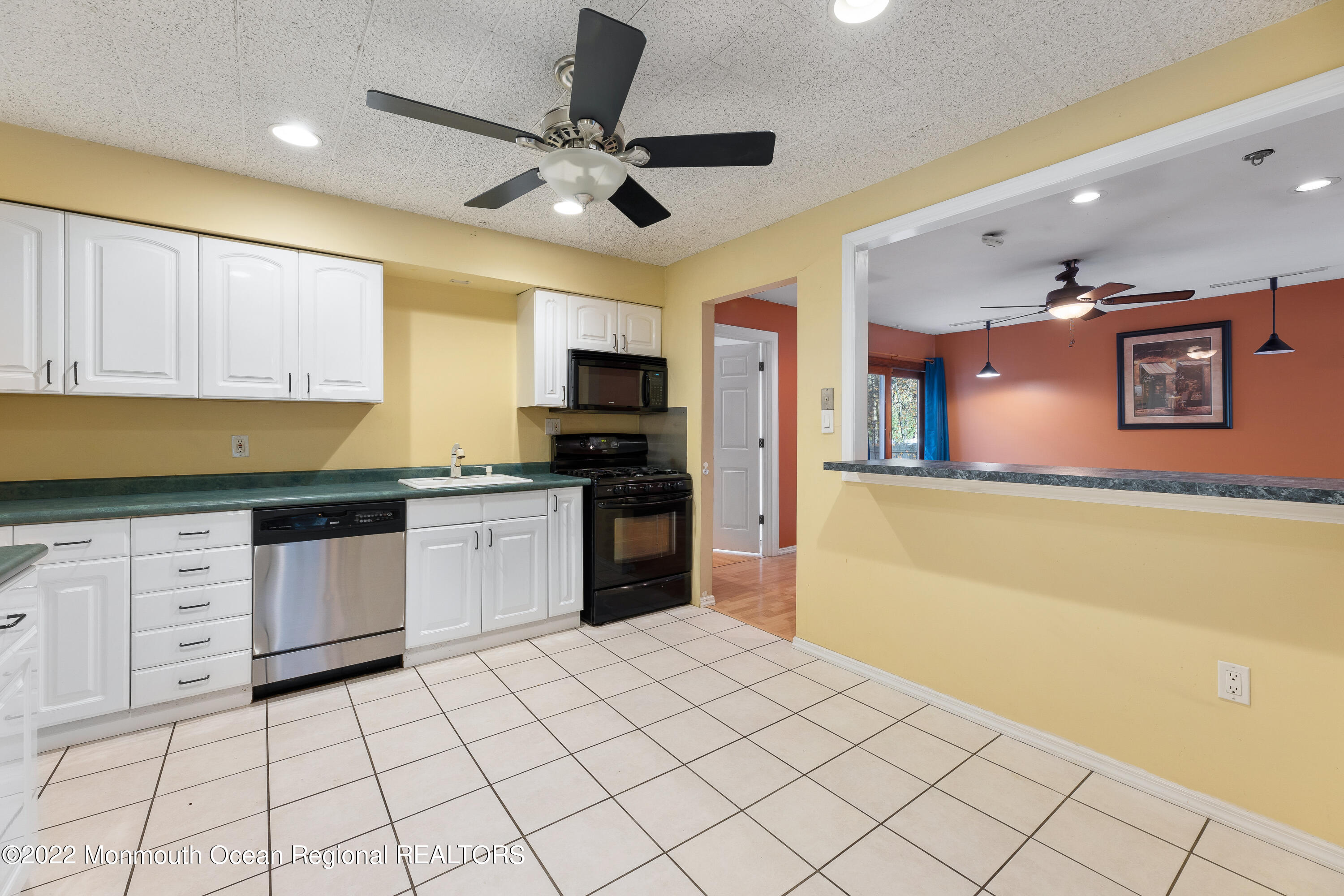 401 Leesville Road Jackson, NJ 08527 - Photo 9 of 25 a kitchen with stainless steel appliances granite countertop a refrigerator and a stove top oven