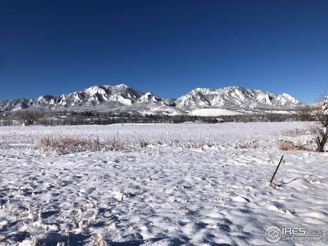 a view of a lake with a mountain