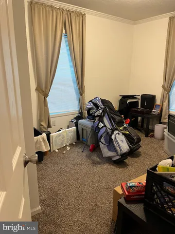 a room with furniture and a window