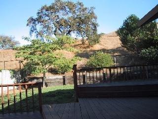 55 Sanchez Way Novato, CA 94947 - Photo 5 of 8 a view of balcony with wooden floor and outdoor seating