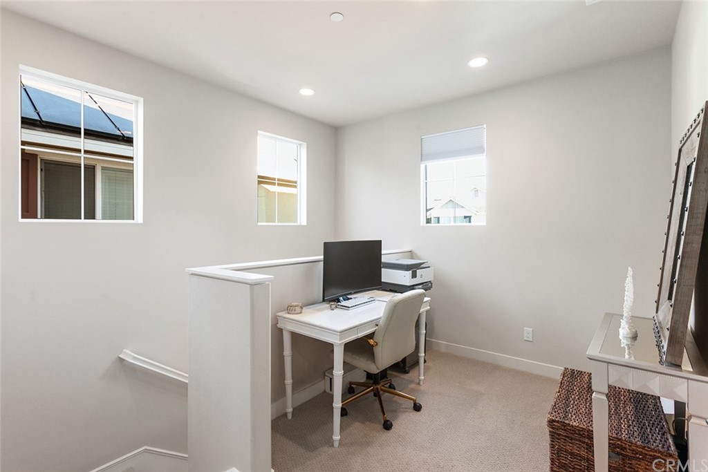 2189 Miner Street Costa Mesa, CA 92627 - Photo 11 of 21 a view of a workspace with furniture and a window