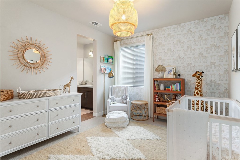 2189 Miner Street Costa Mesa, CA 92627 - Photo 17 of 21 a bedroom with furniture and a window