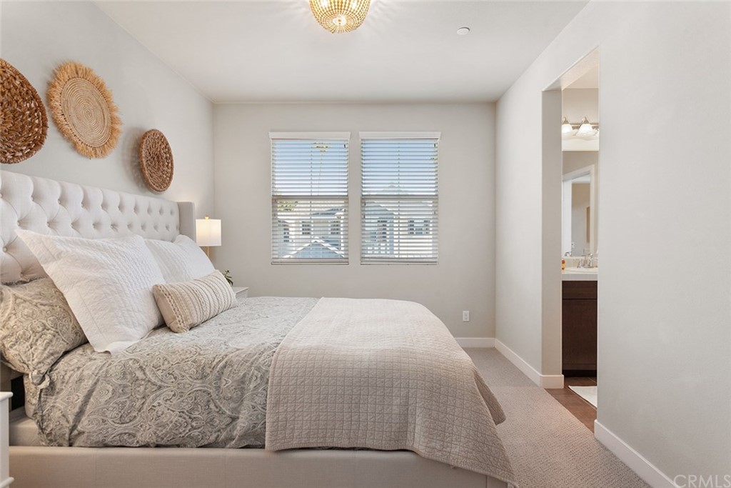 2189 Miner Street Costa Mesa, CA 92627 - Photo 19 of 21 a bedroom with a large bed and a window