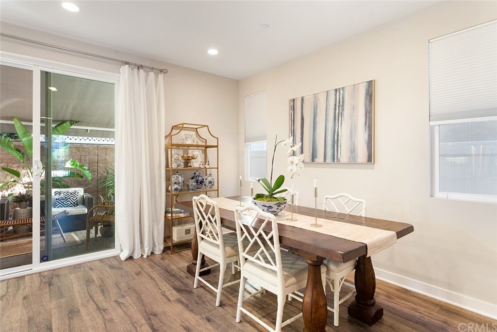 2189 Miner Street Costa Mesa, CA 92627 - Photo 5 of 21 a view of a dining room with furniture window and wooden floor