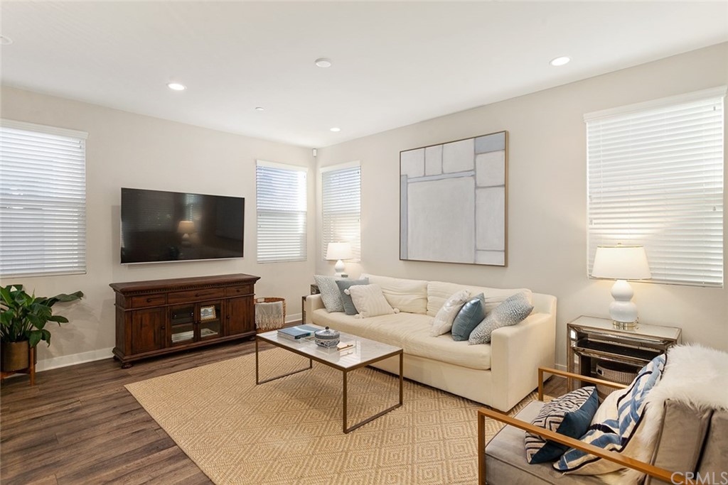 2189 Miner Street Costa Mesa, CA 92627 - Photo 8 of 21 a living room with furniture and a flat screen tv