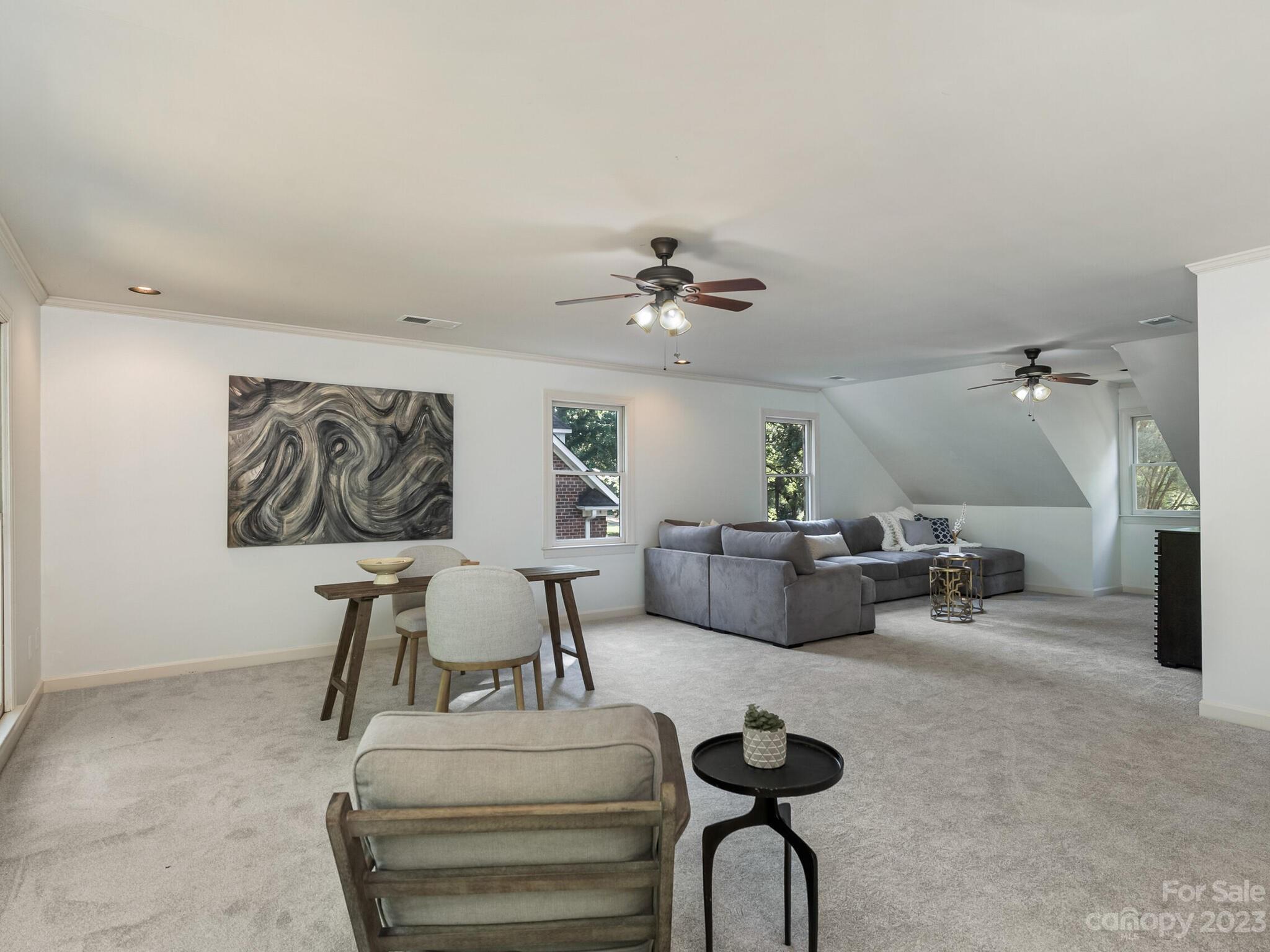 4615 Nora's Path Road Charlotte, NC 28226 - Photo 17 of 34 a living room with furniture and a table