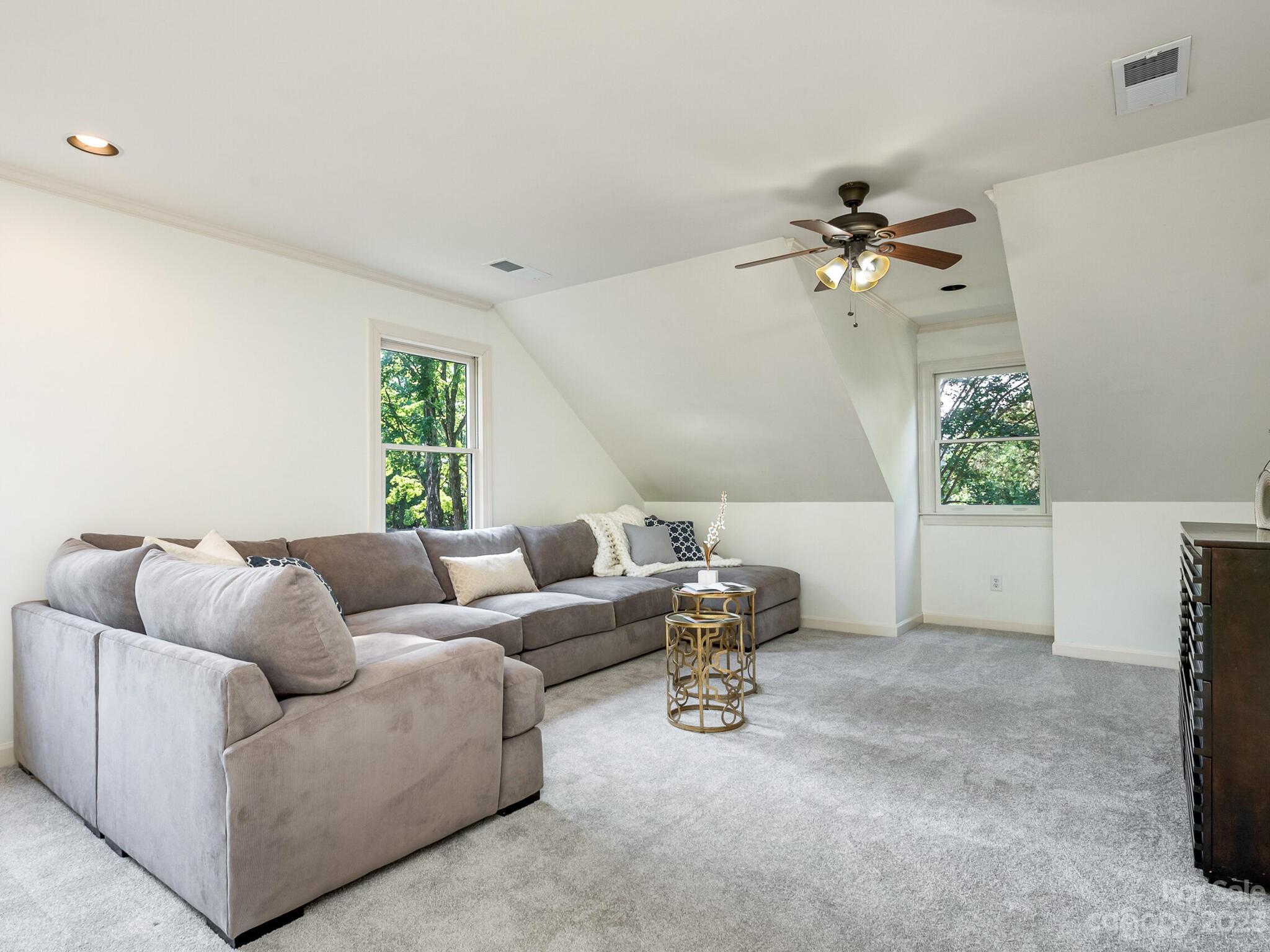 4615 Nora's Path Road Charlotte, NC 28226 - Photo 18 of 34 a living room with furniture