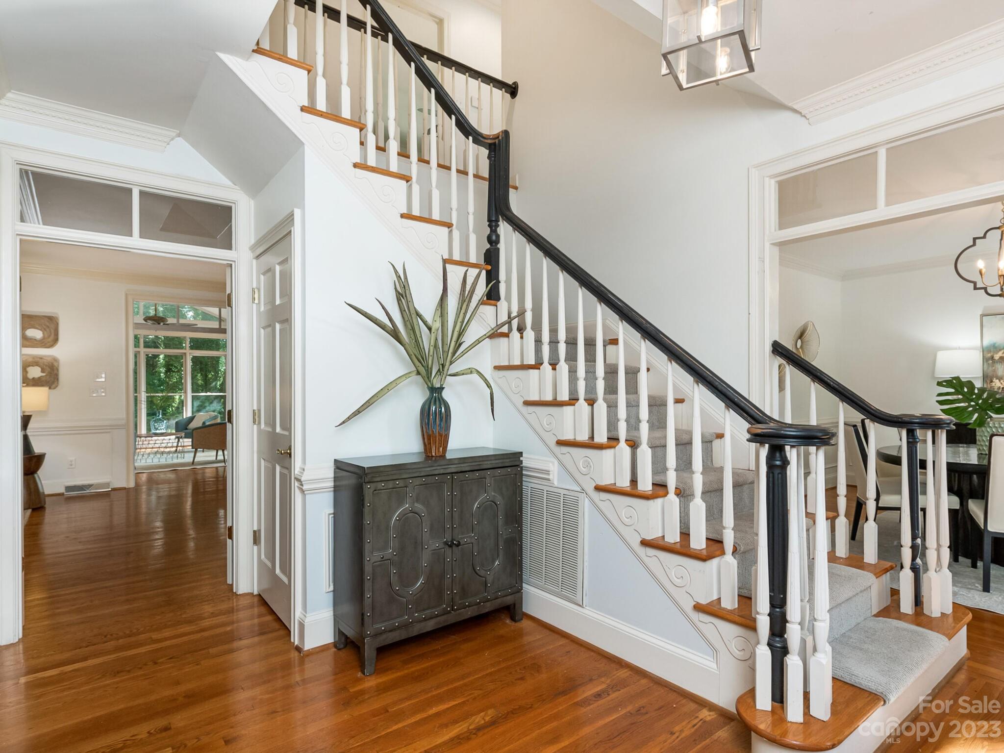 4615 Nora's Path Road Charlotte, NC 28226 - Photo 5 of 34 a view of entryway with wooden floor and stairs