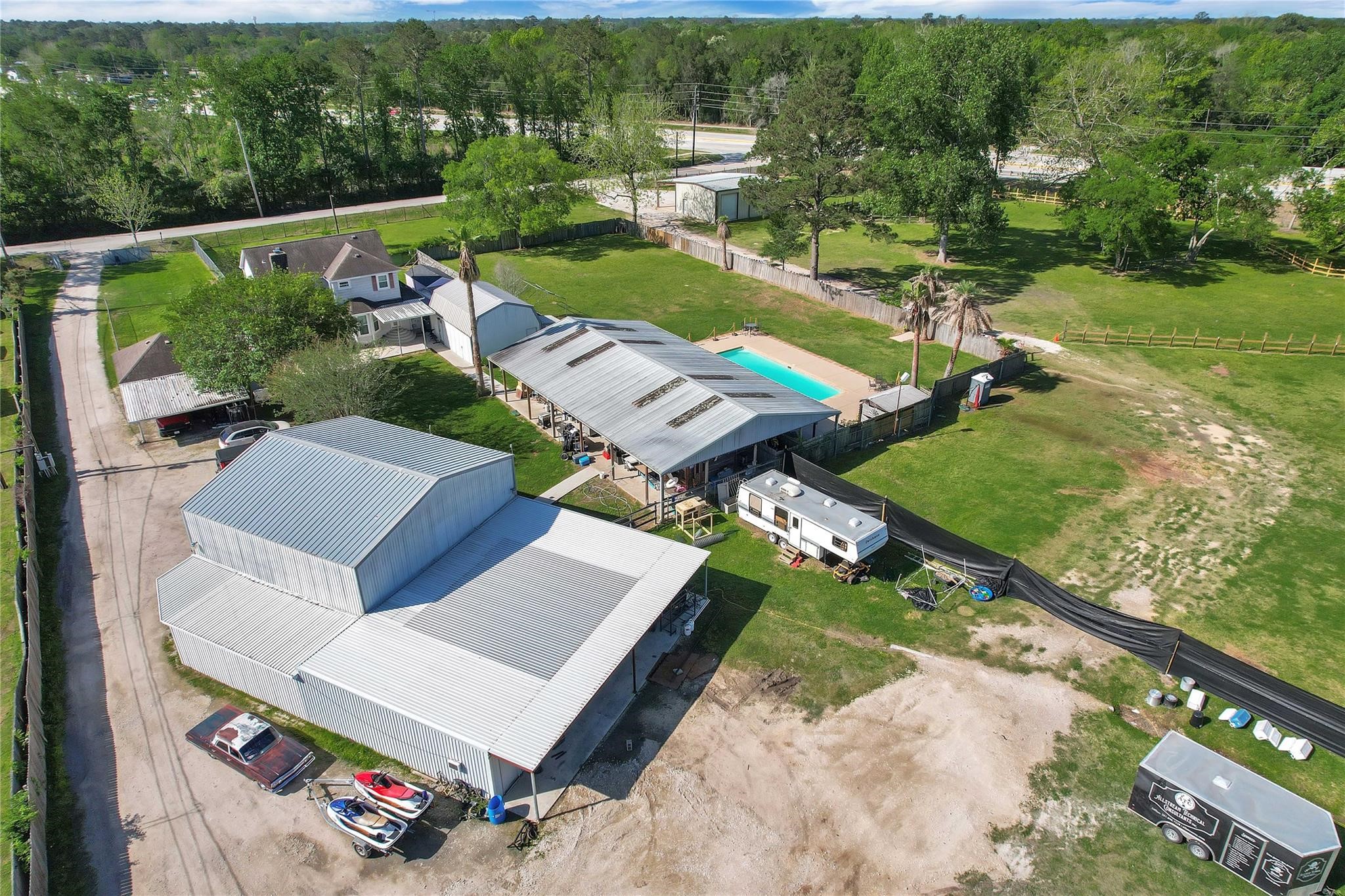215 Reidland Road Crosby, TX 77532 - Photo 30 of 37 an aerial view of a house with garden space lake view and mountain view in back