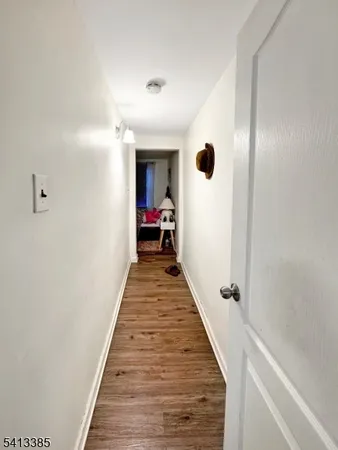 a bedroom with bed and a dresser