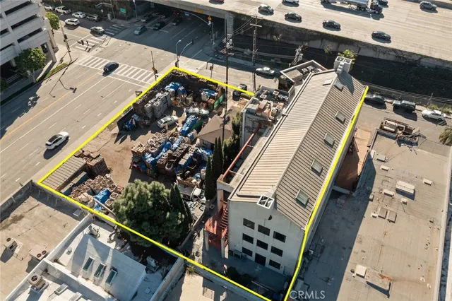 an aerial view of a house with outdoor space
