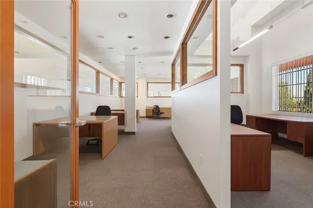 a view of living room with furniture and window