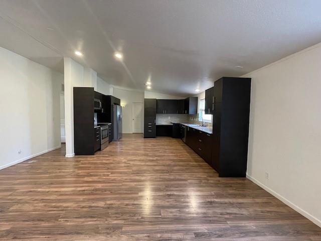 190 Private Road 4435 Rhome, TX 76078 - Photo 15 of 29 a view of kitchen with refrigerator cabinets and wooden floor