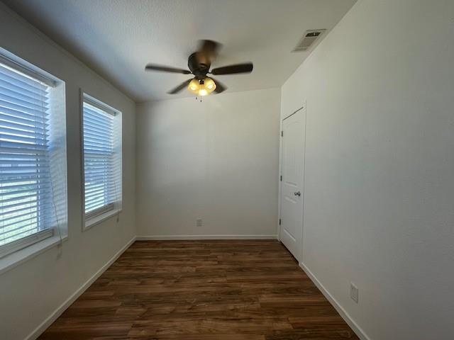 190 Private Road 4435 Rhome, TX 76078 - Photo 4 of 29 a view of a room with wooden floor and window