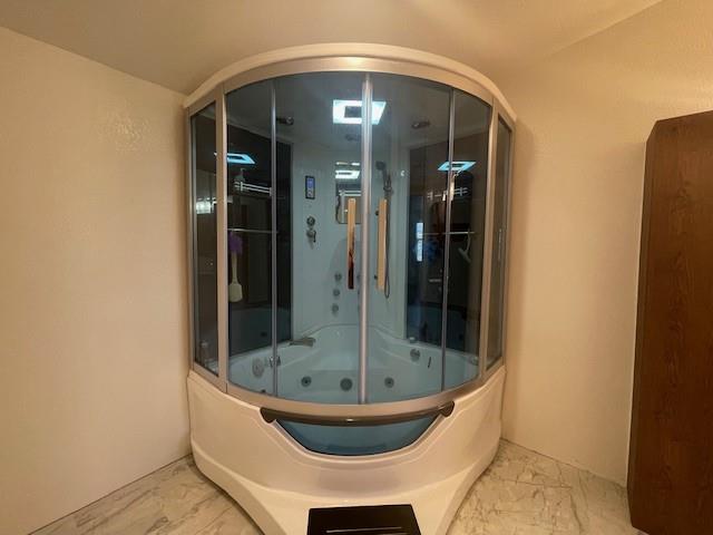 190 Private Road 4435 Rhome, TX 76078 - Photo 8 of 29 an empty room with mirror