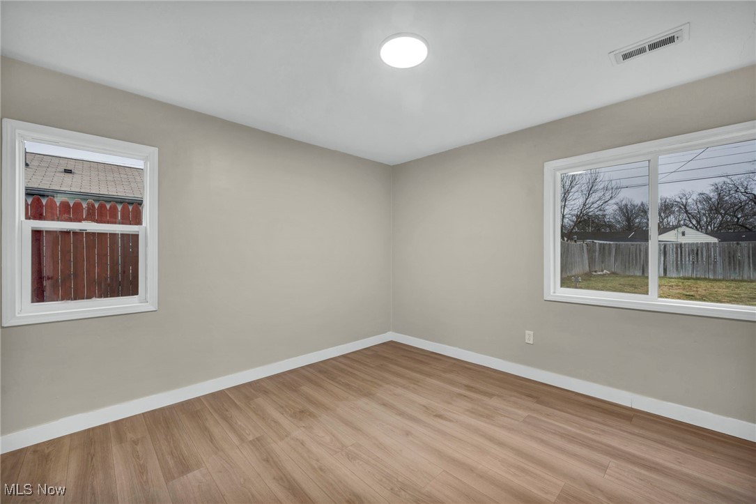 614 Weller Road Elyria, OH 44035 - Photo 26 of 39 Spare room with baseboards and light wood-type flooring