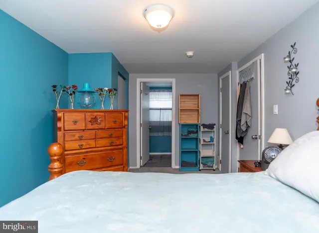 a room with furniture and a dresser