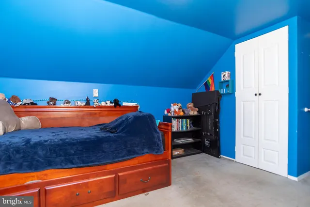 a room with furniture and a closet