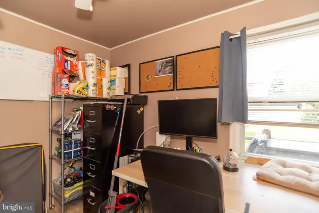 a room with furniture and a window