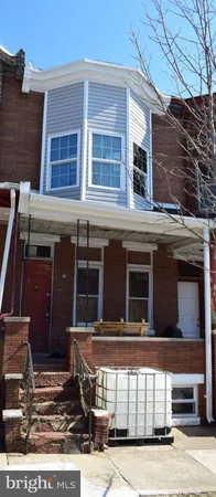 a front view of a house with a garage