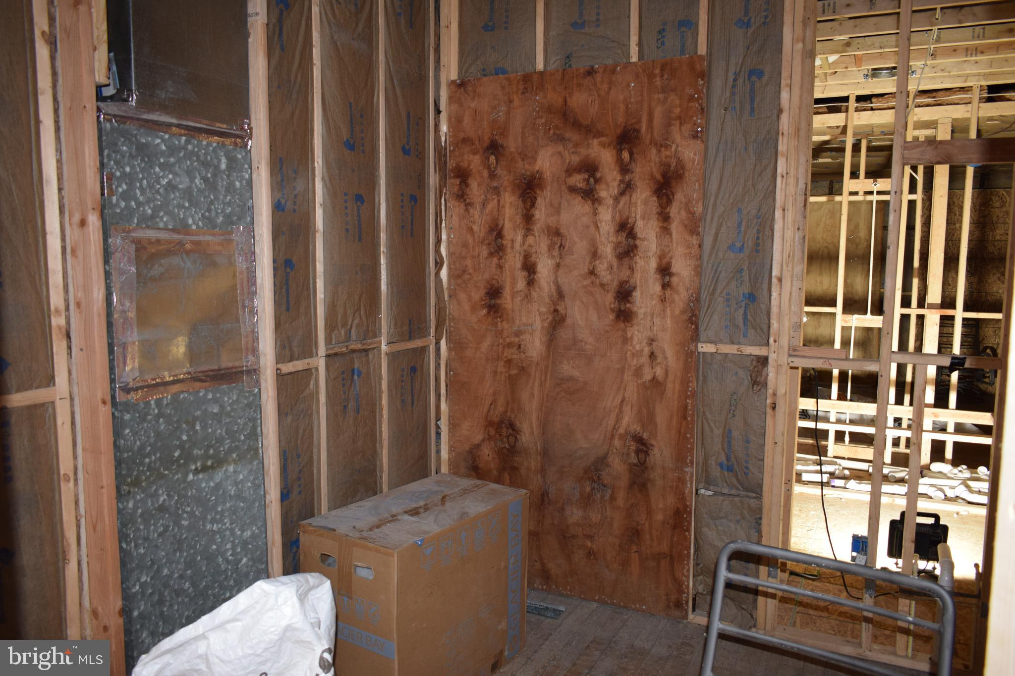 1639 Appleton Street Baltimore, MD 21217 - Photo 11 of 15 a bathroom with a toilet and shower