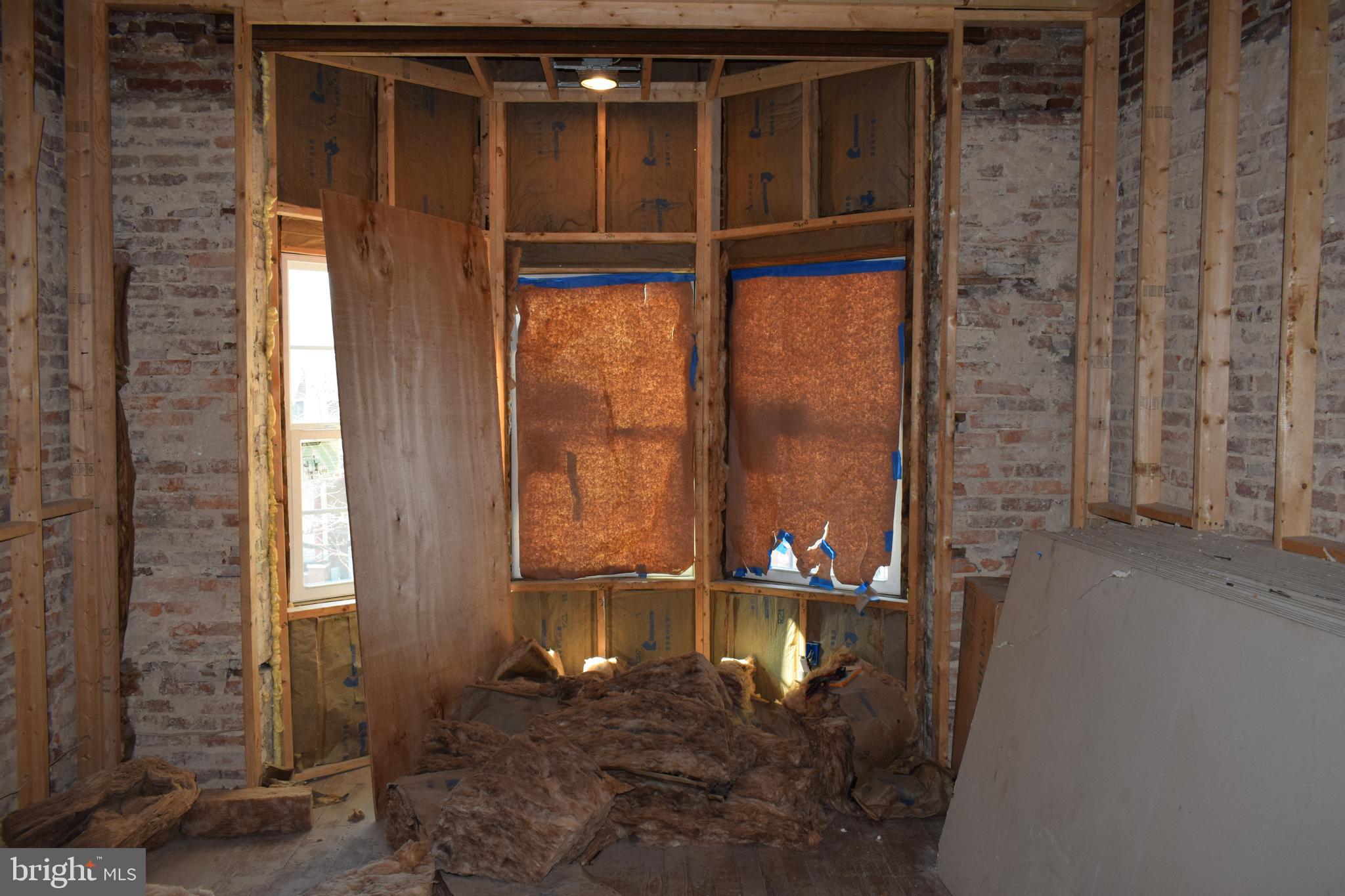 1639 Appleton Street Baltimore, MD 21217 - Photo 5 of 15 a bathroom with a shower