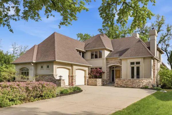 front view of a house with a garden