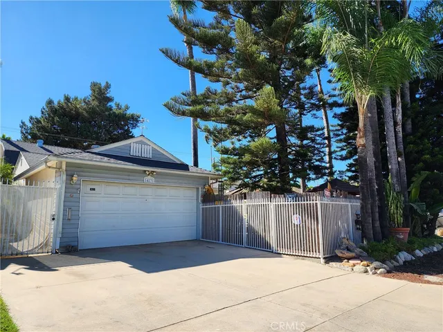 a view of a wooden fence