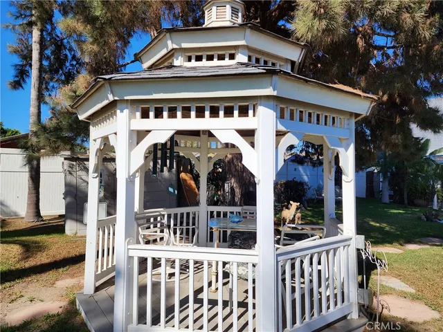 a view of a street with stores