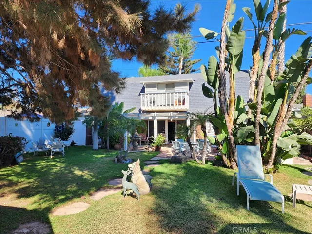 a view of a building with a yard