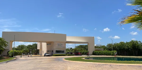 a view of a building with a yard