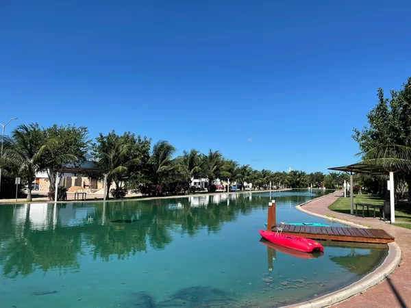 a view of swimming pool outdoor seating and lake