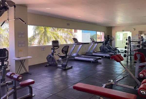 a view of a room with gym equipment