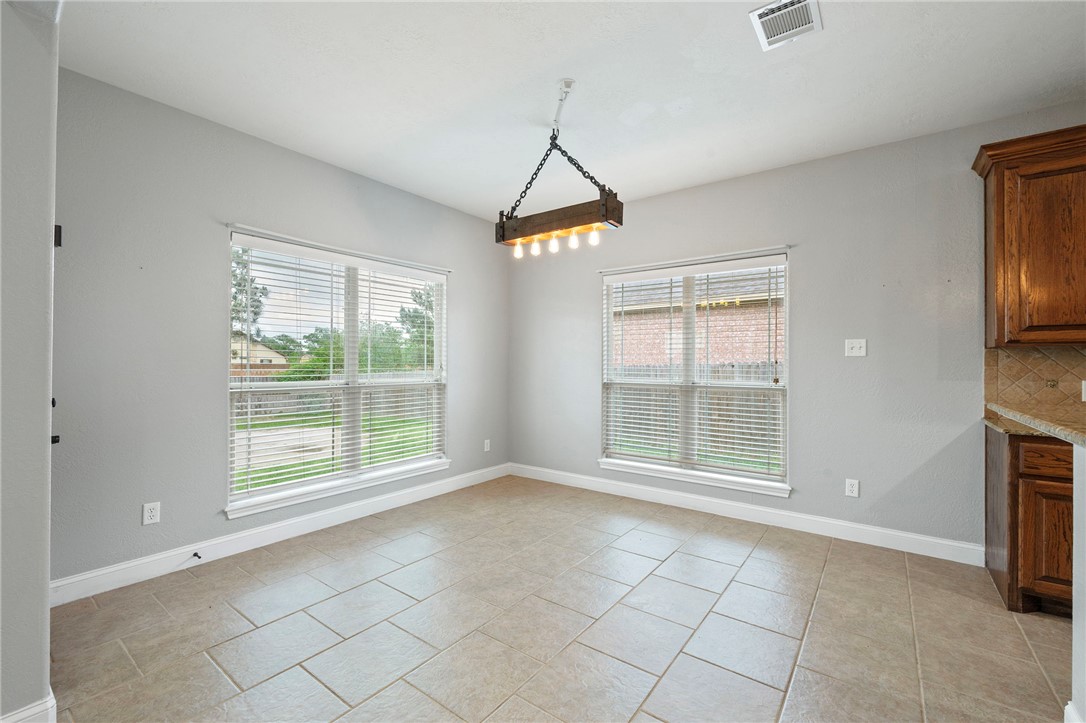 3304 Keefer Loop College Station, TX 77845 - Photo 7 of 21 a view of an empty room with a window