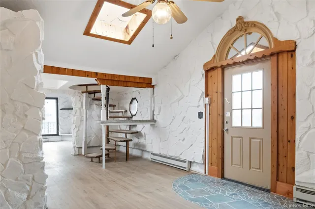 a view of livingroom with furniture and window