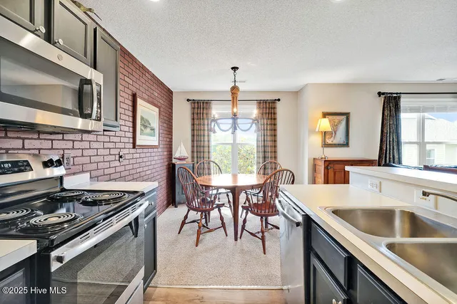 $304,500 | 3350 Club Villas Drive, Unit 105, Southport, NC 28461