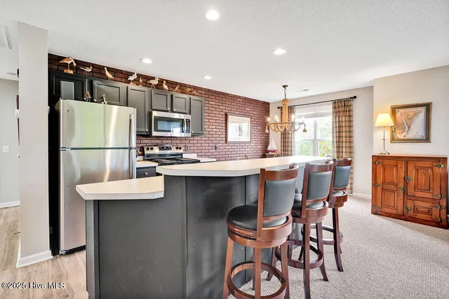 $304,500 | 3350 Club Villas Drive, Unit 105, Southport, NC 28461