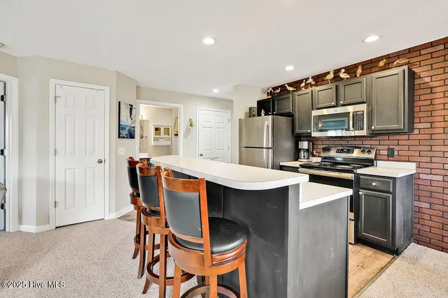 $304,500 | 3350 Club Villas Drive, Unit 105, Southport, NC 28461