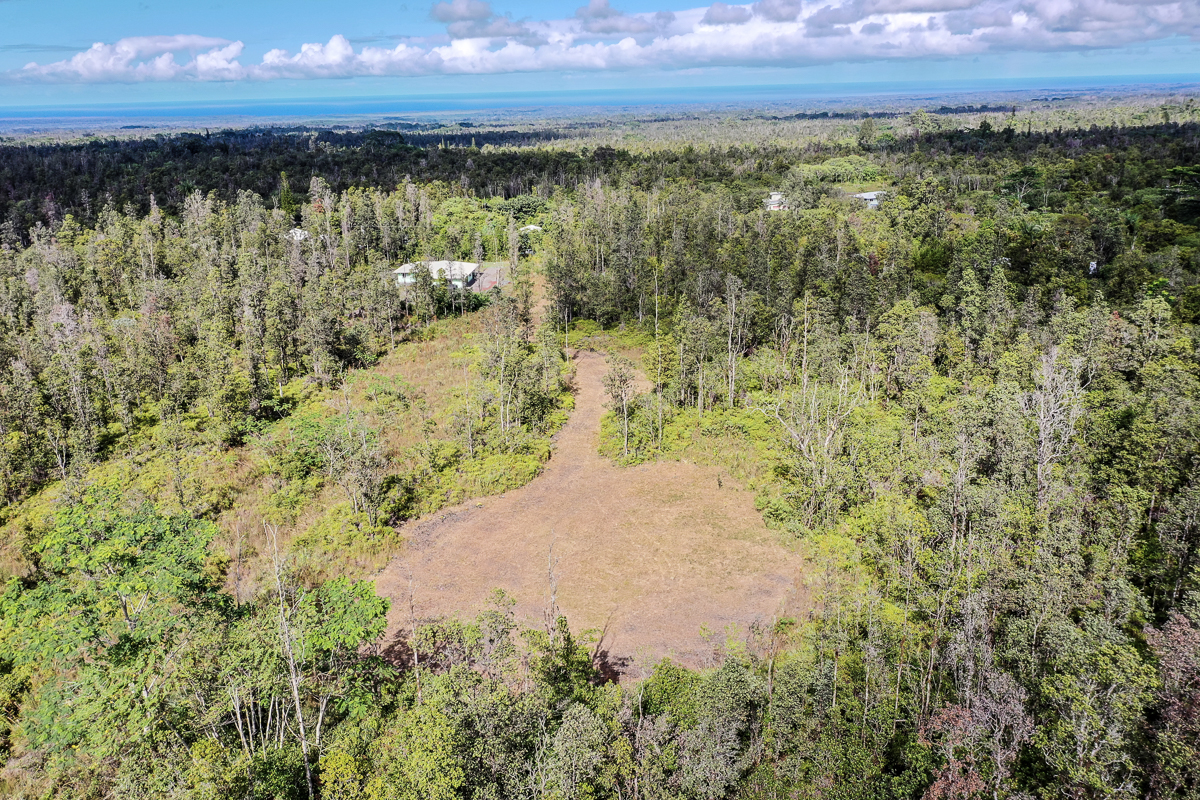 16-1474 Lot 3038 Hopue Rd Mountain View Mountain View, HI 96771 - Photo 24 of 30 a view of a lake with a city