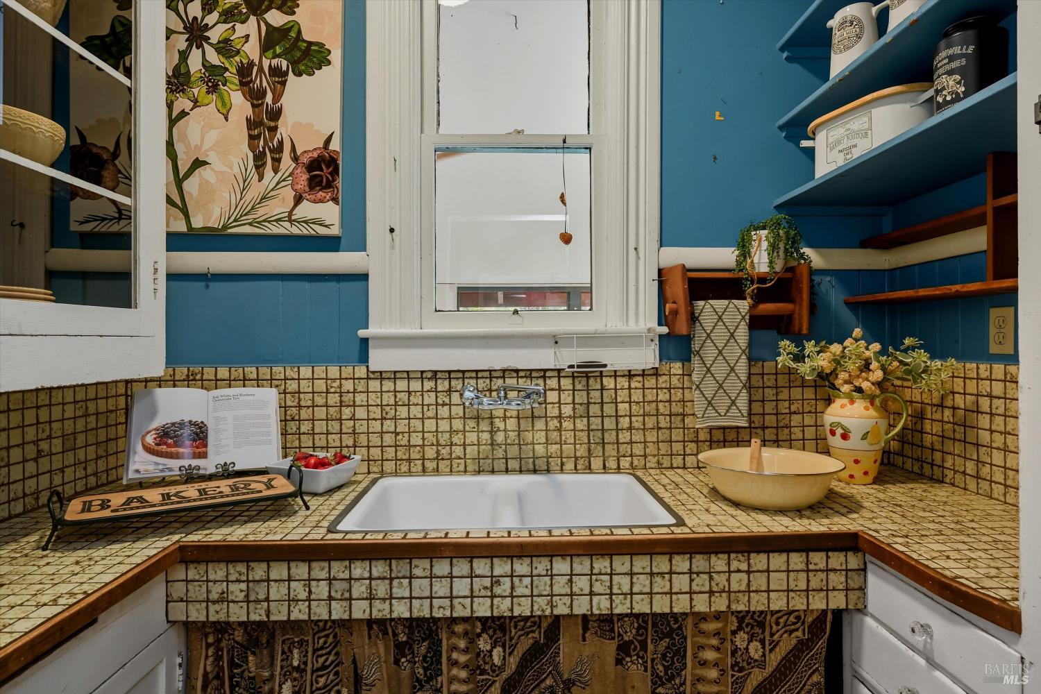 722 Beaver Street Santa Rosa, CA 95404 - Photo 13 of 29 a view of a wooden chairs and table in a balcony