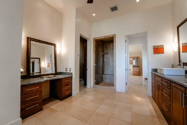 a kitchen with granite countertop a stove and a sink