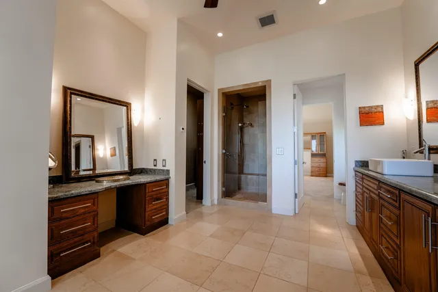 a kitchen with granite countertop a stove and a sink