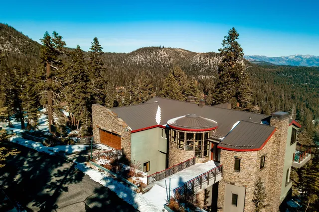 a view of a city with a mountain in the background