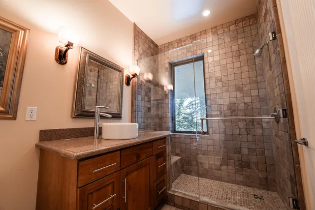 a bed room with a bed and a tv