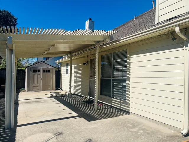 a view of a house with a patio