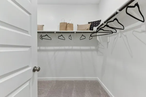 a view of a room with racks on the wall