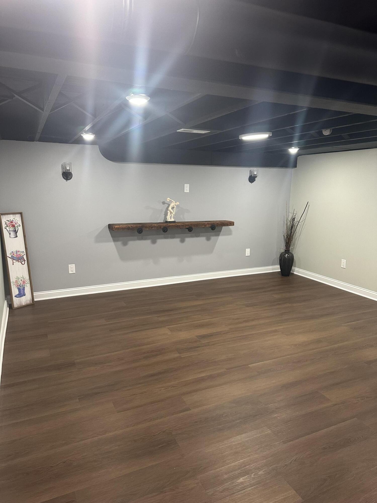 556 Gerry Street Gary, IN 46406 - Photo 12 of 21 a view of empty room with wooden floor